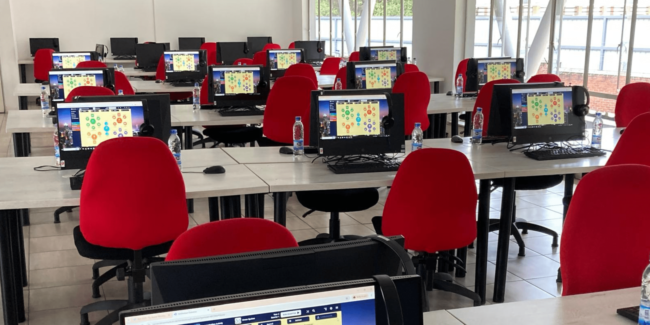 Evolution, the best and most authentic business simulation game, on many computers in a Cambridge school.